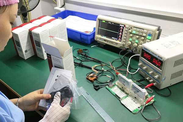 The worker examined the package carefully.