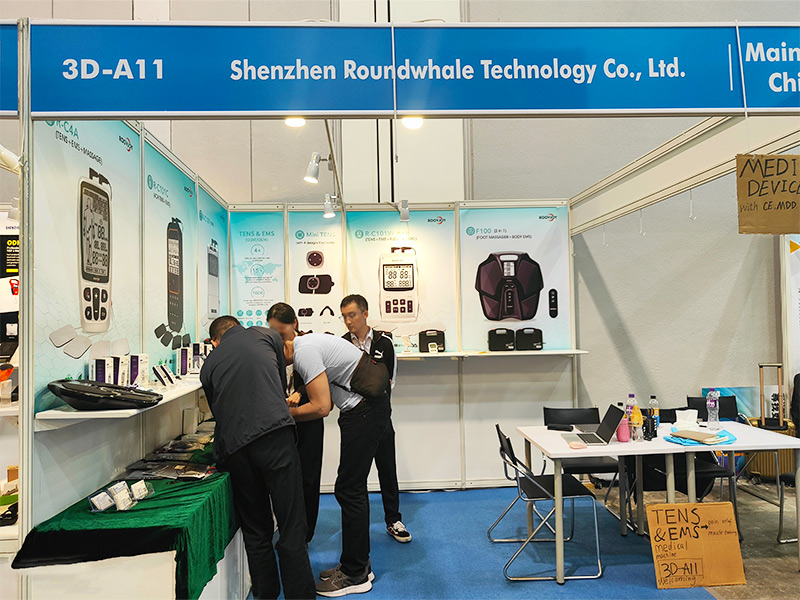 Customers carefully study the products accompanied by our staffs.